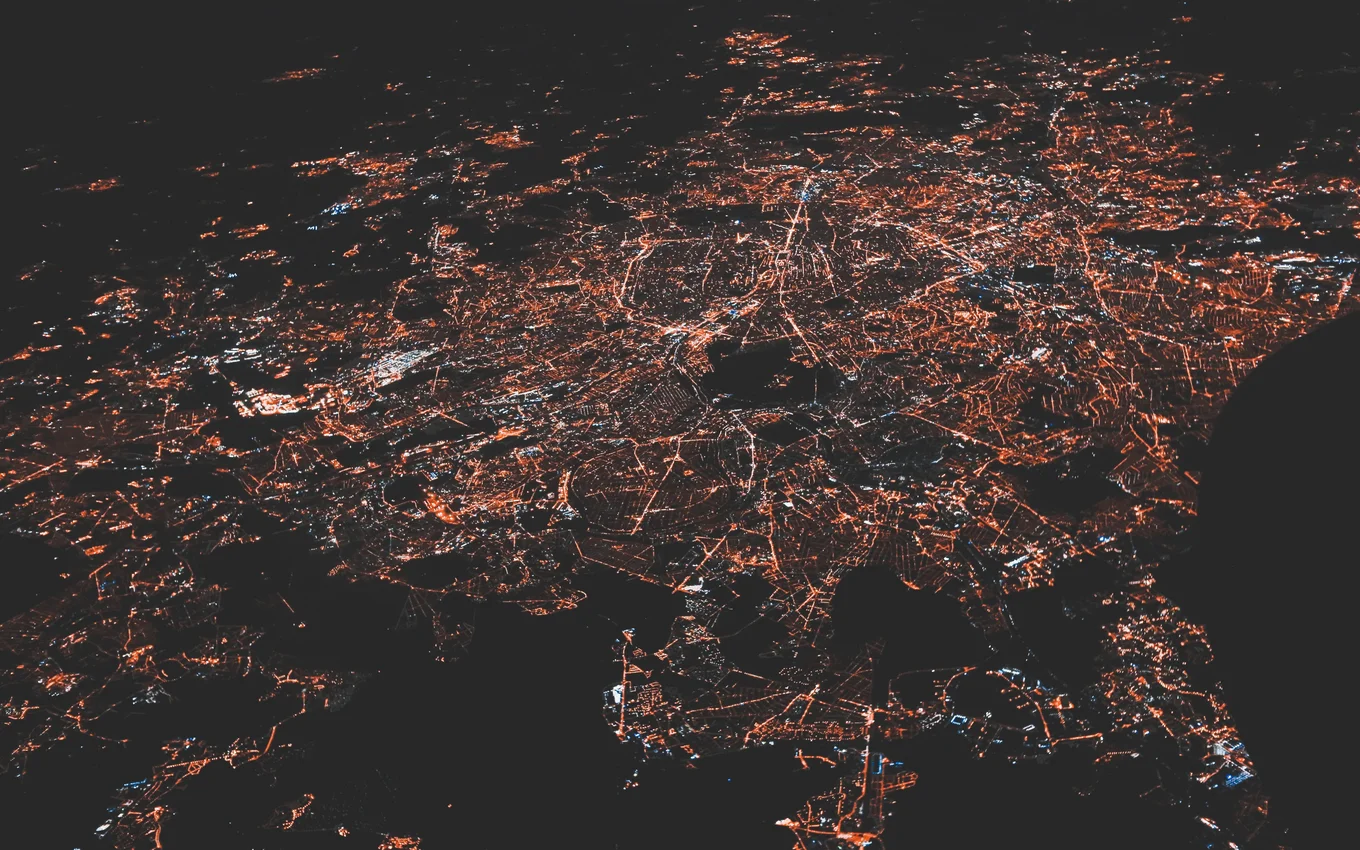 City lights at night from an aerial view.